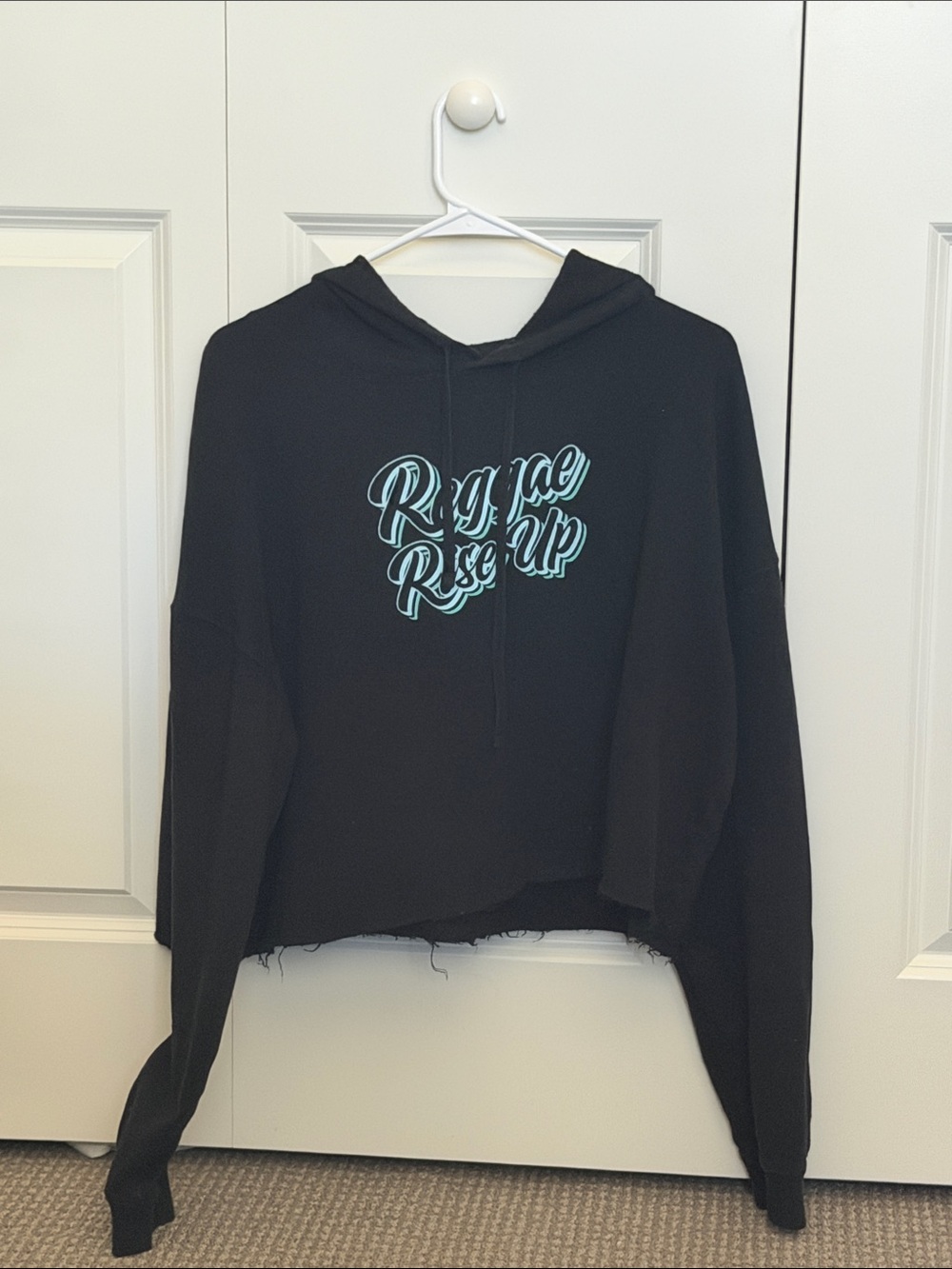 Reggae Rise Up Black Cropped Hoodie with Teal Script Graphic